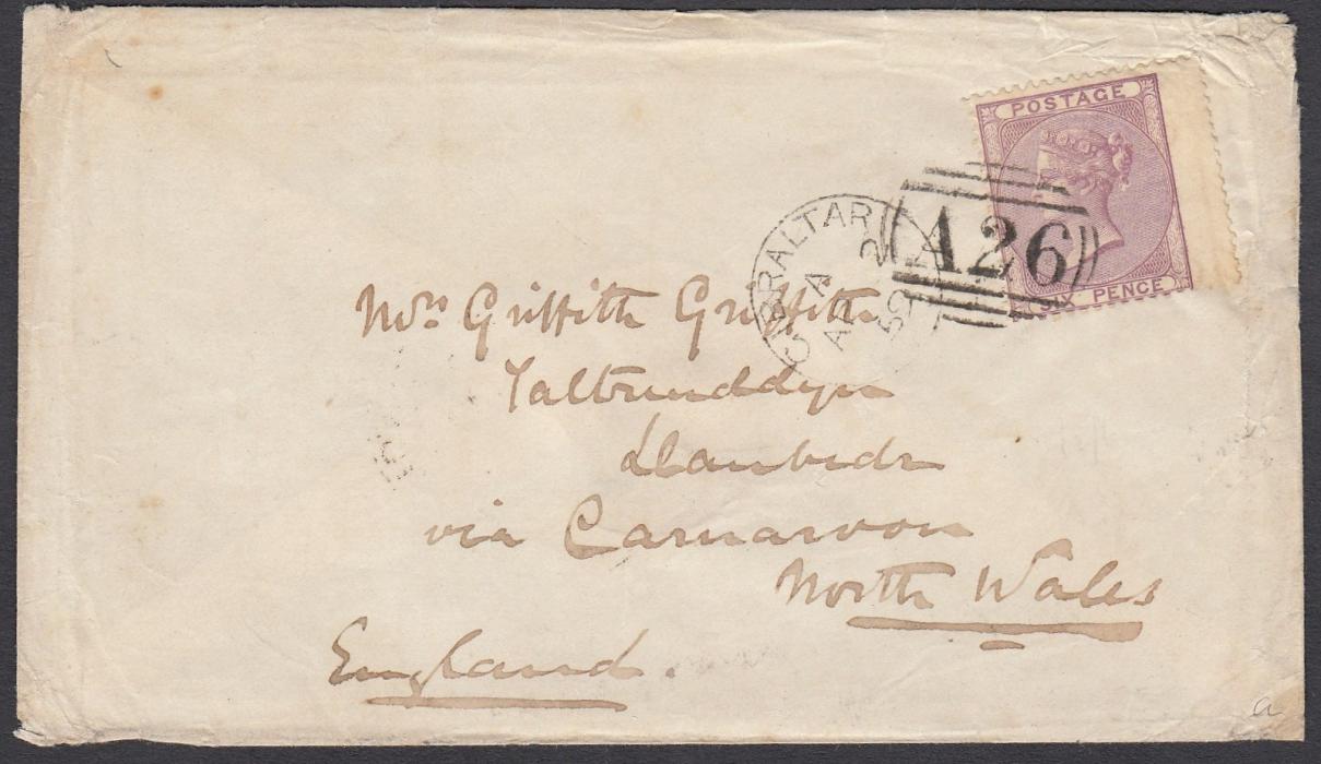 GIBRALTAR 1859 cover to Llanbadn, Wales, franked GB 5d wing marginal tied by barred oval A26 with Gibraltar cds in association, Carnarvon transit backstamp. The cover with peripheral wear but the stamp very fine with an exceptional strike. An attractive early example of the A26 obliterator (introduced 20 Feb 1859).